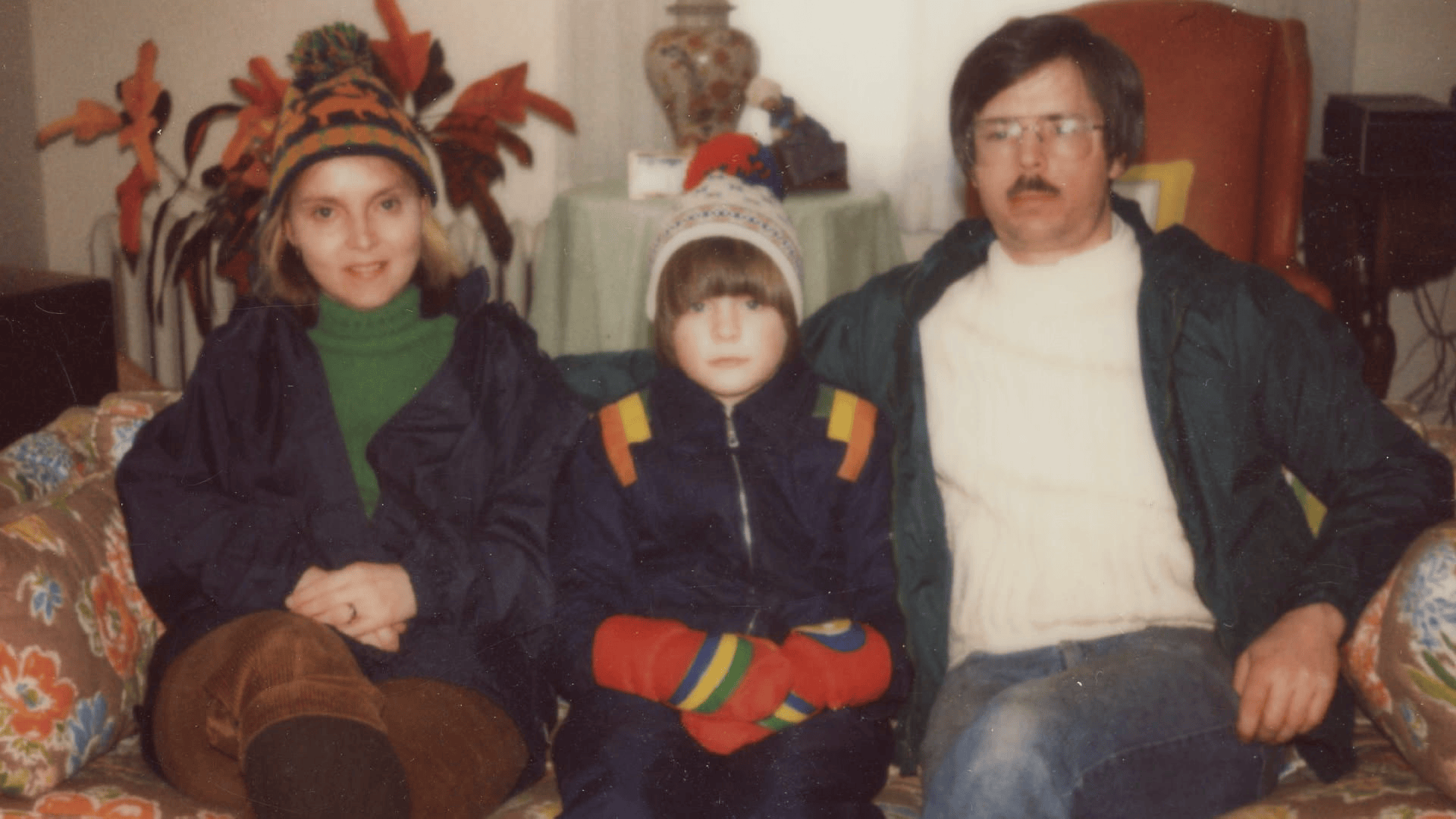 A photo of a girl and her parents