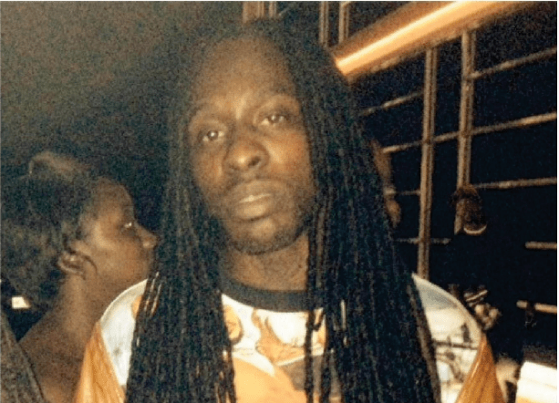 Damon Landor, a Black man with dreadlocks and for religious reasons does not cut his hair