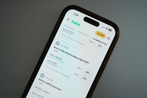 The prediction market app Kalshi is displayed on a mobile phone
