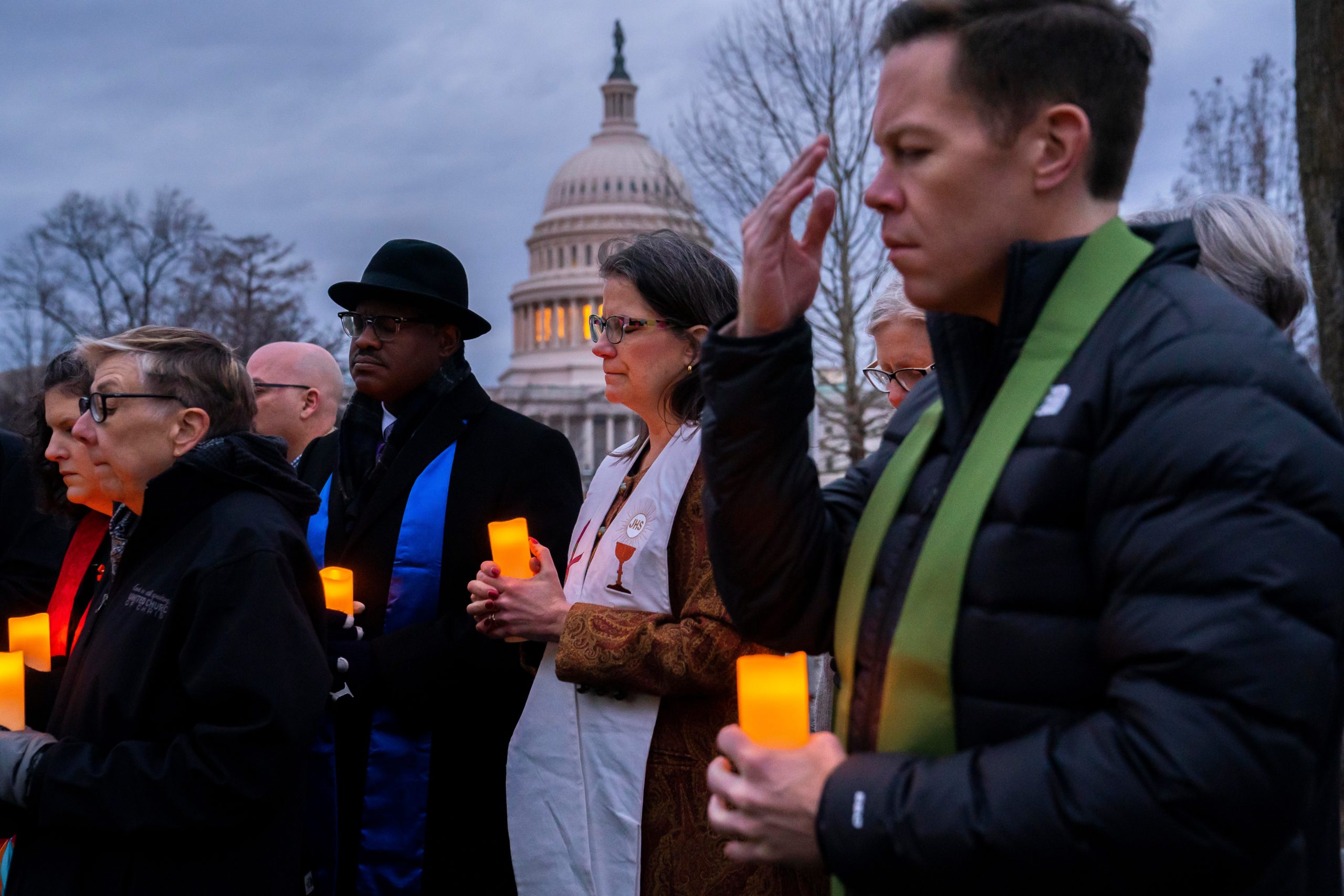 Community faith leaders gather for a prayer vigil in front of the US Capitol in 2023.