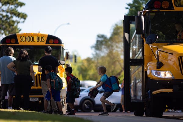 Students arrive at a school
