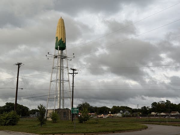 Rochester's corn-shaped water tower stands against a gray, cloudy sky.