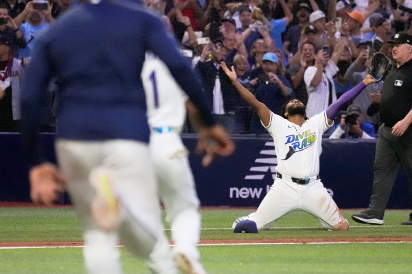 Tampa Bay Rays third baseman Junior Caminero celebrates their win against the Cleveland Guardians in Game 6 of an American League Championship Series baseball game in St. Petersburg, Fla. Monday, Oct. 19, 2026.