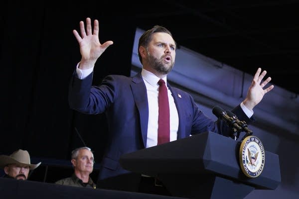 JD Vance speaking with hands raised